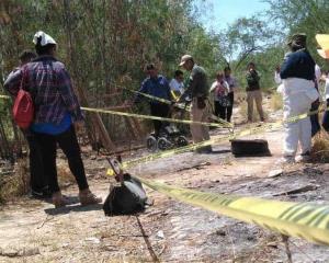 Suman 65 cuerpos y más de 5 mil restos hallados en fosa de Arbolillo