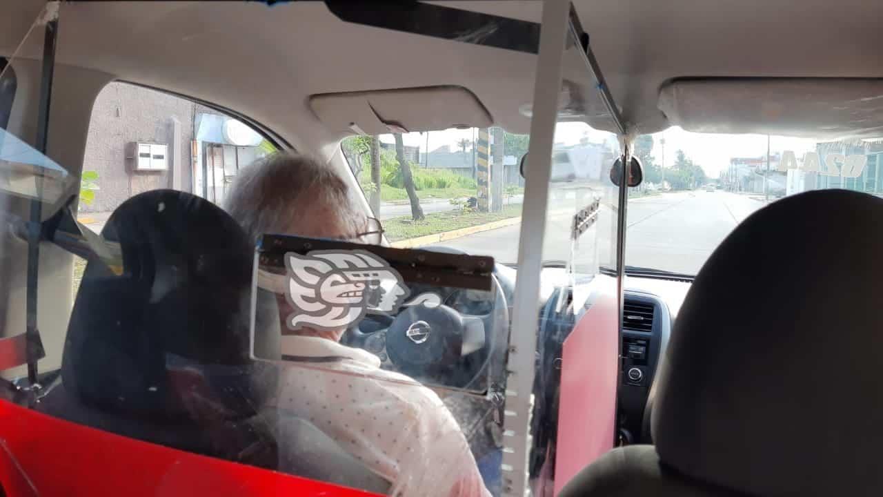 (+Video) La pandemia sigue; taxista porteño da el ejemplo con cabina anticovid